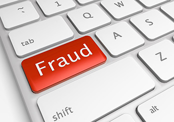 Left side of a keyboard with a red "fraud" button replacing the "caps lock" key