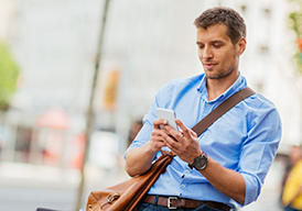 man looking at smartphone