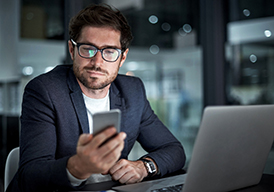 man using a smartphone