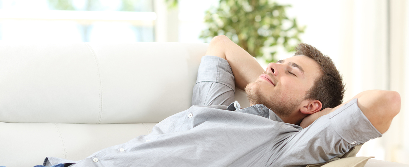 Man relaxing on a couch