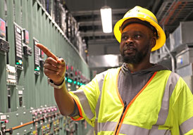 PSE&G worker performing safety check on systems.